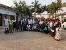 Participants and facilitators pose for a photo before the commencement of the workshop