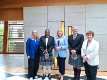 Dr. Christopher Kalila, MP poses for a picture with the Presiding Officer (PO) of the Scottish Parliament ,Alison Johnstone MSP to his left