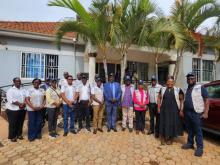 Hon Moses F Moyo, MP poses with the observer team